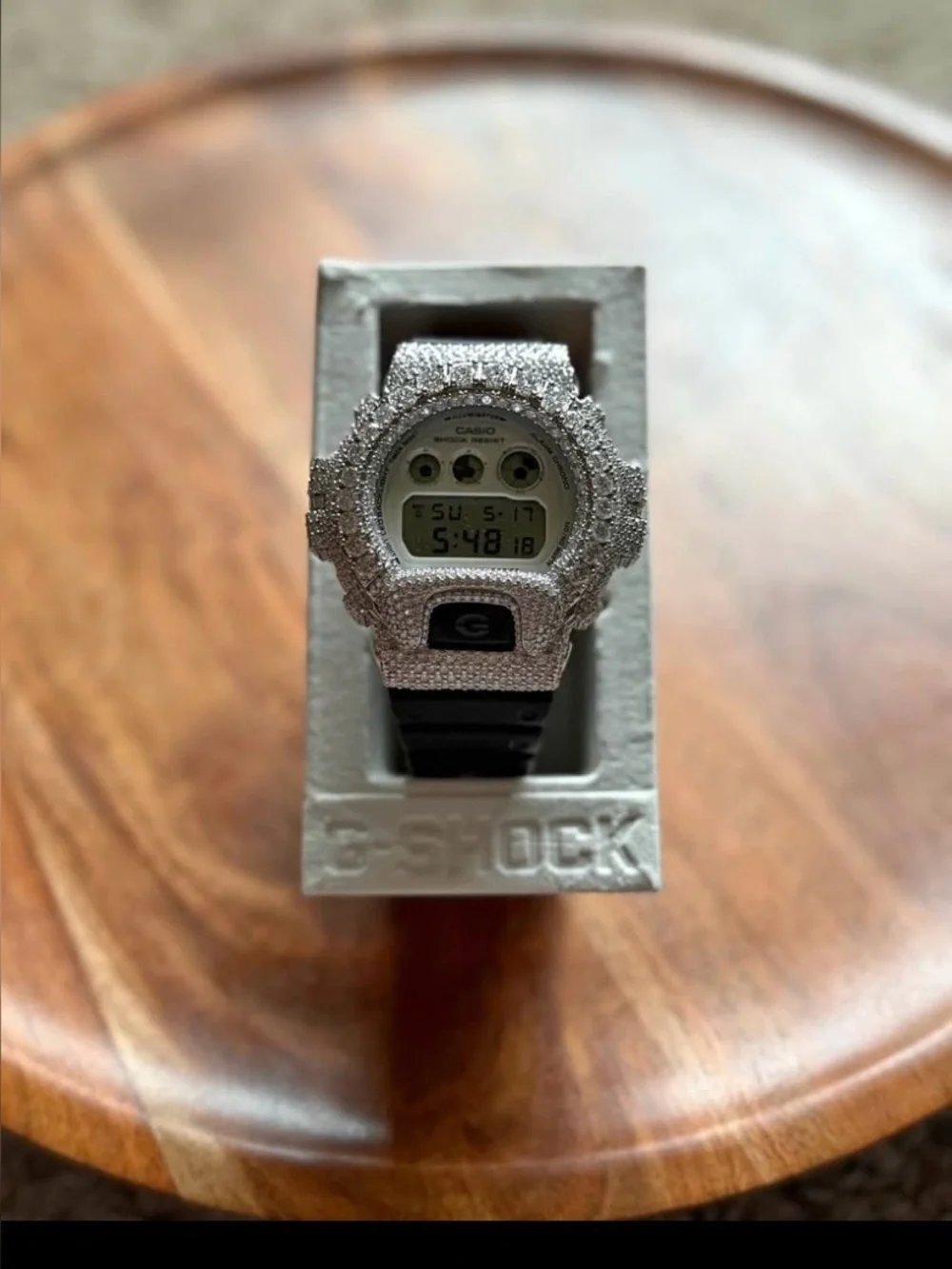 Casio silver crystal G-Shock with black strap